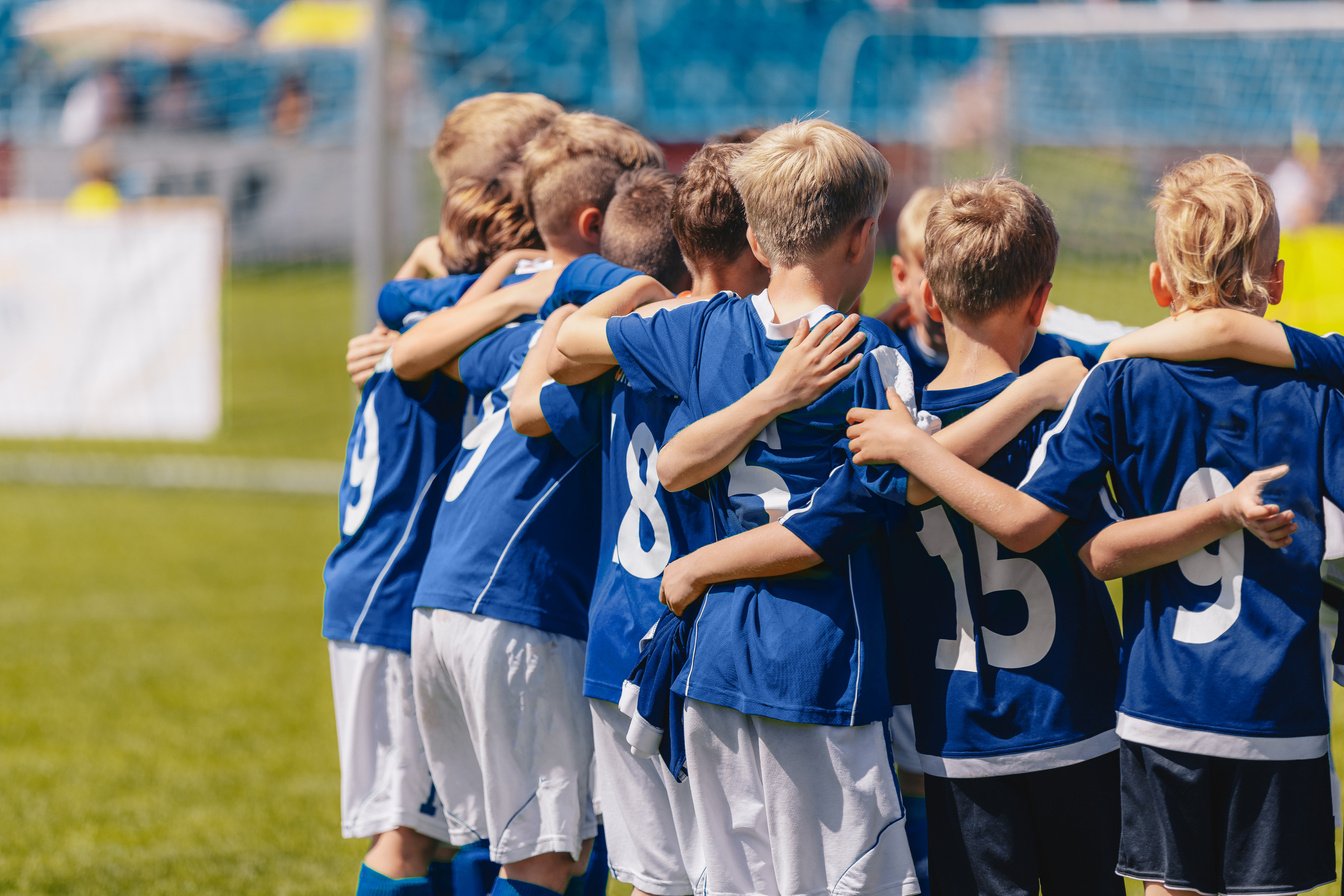 Young Boys of Sports Soccer Club Team Standing Together United.